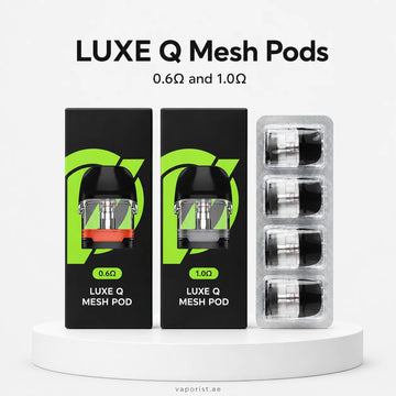 Two black LUXE Q Mesh Pod boxes, one labeled 0.6Ω and one 1.